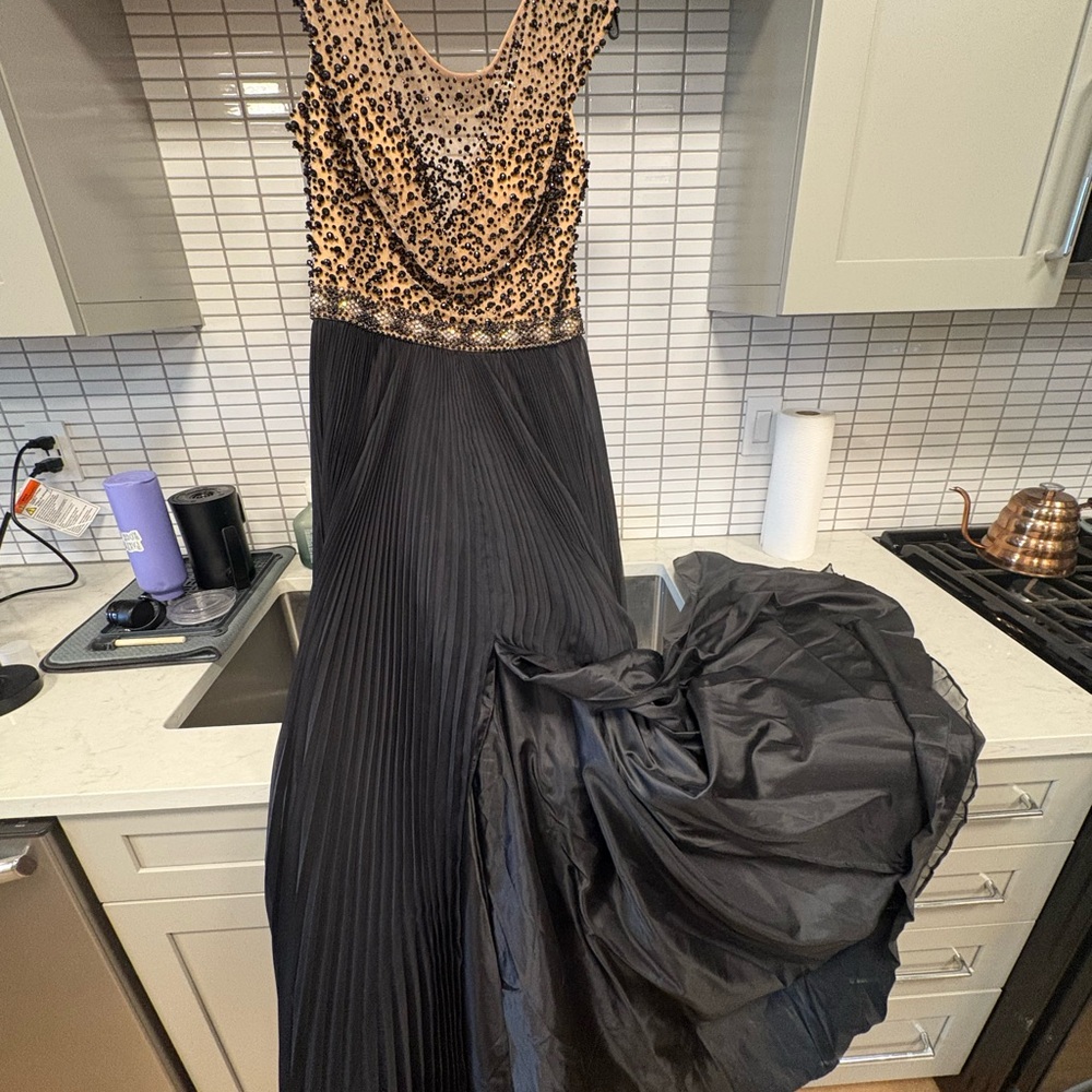 Sherri Hill Black and Nude Beaded Top With Pleated Bottom Formal Gown
